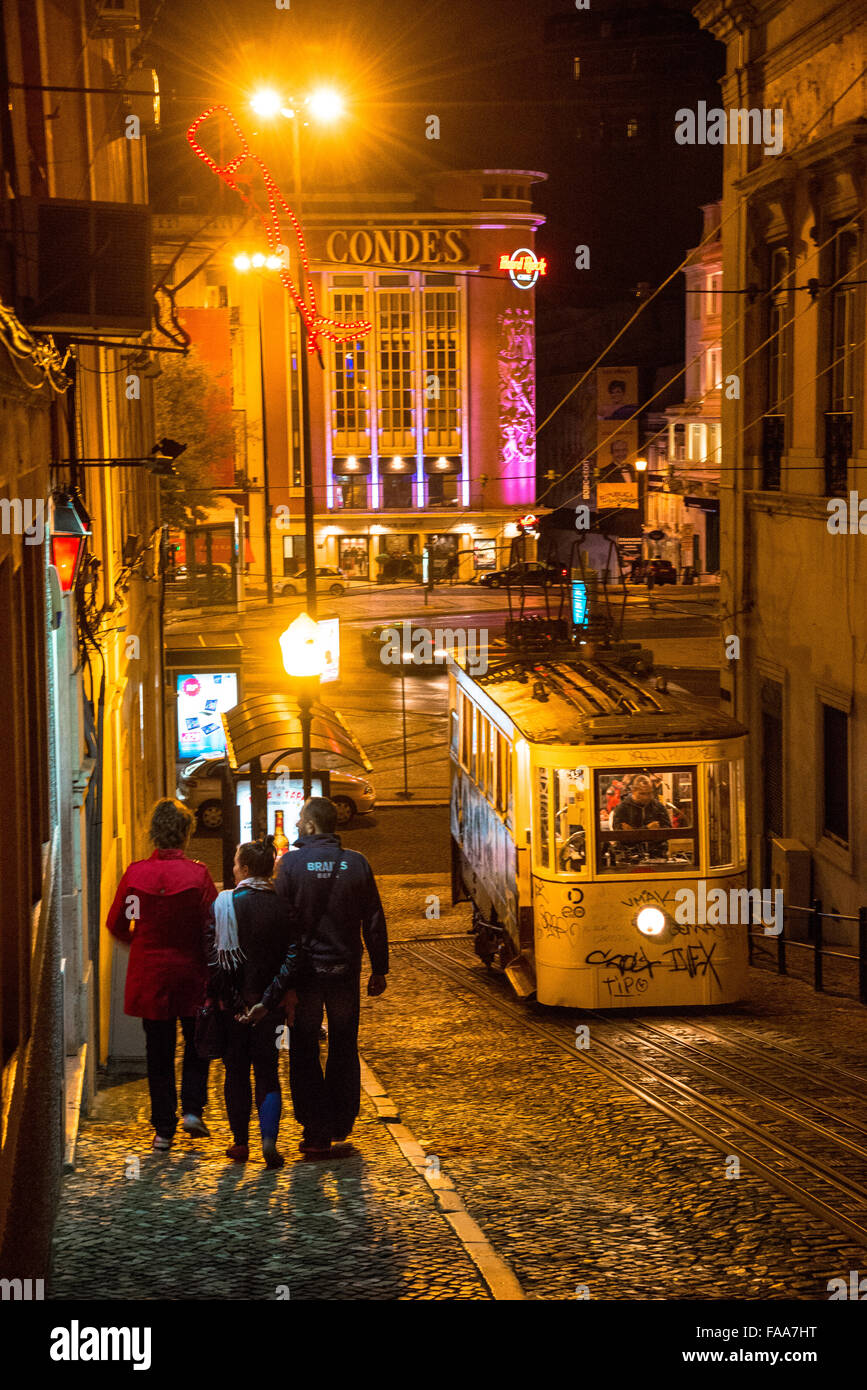 famous trams in centre of lisboa portugal at night Stock Photo