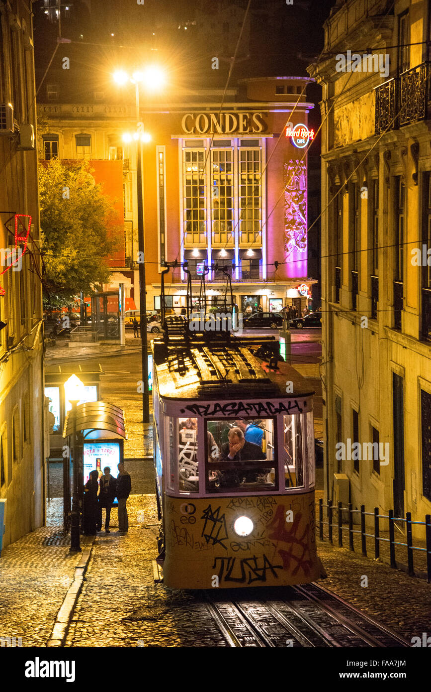 famous trams in centre of lisboa portugal at night Stock Photo