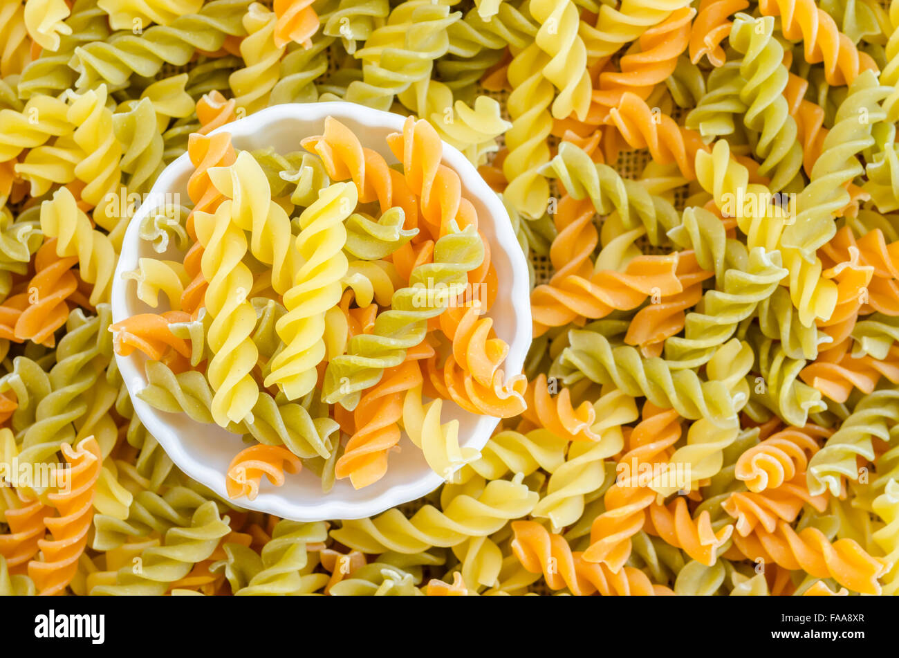 Three Colors Rotini Pasta in white bowl Stock Photo Alamy