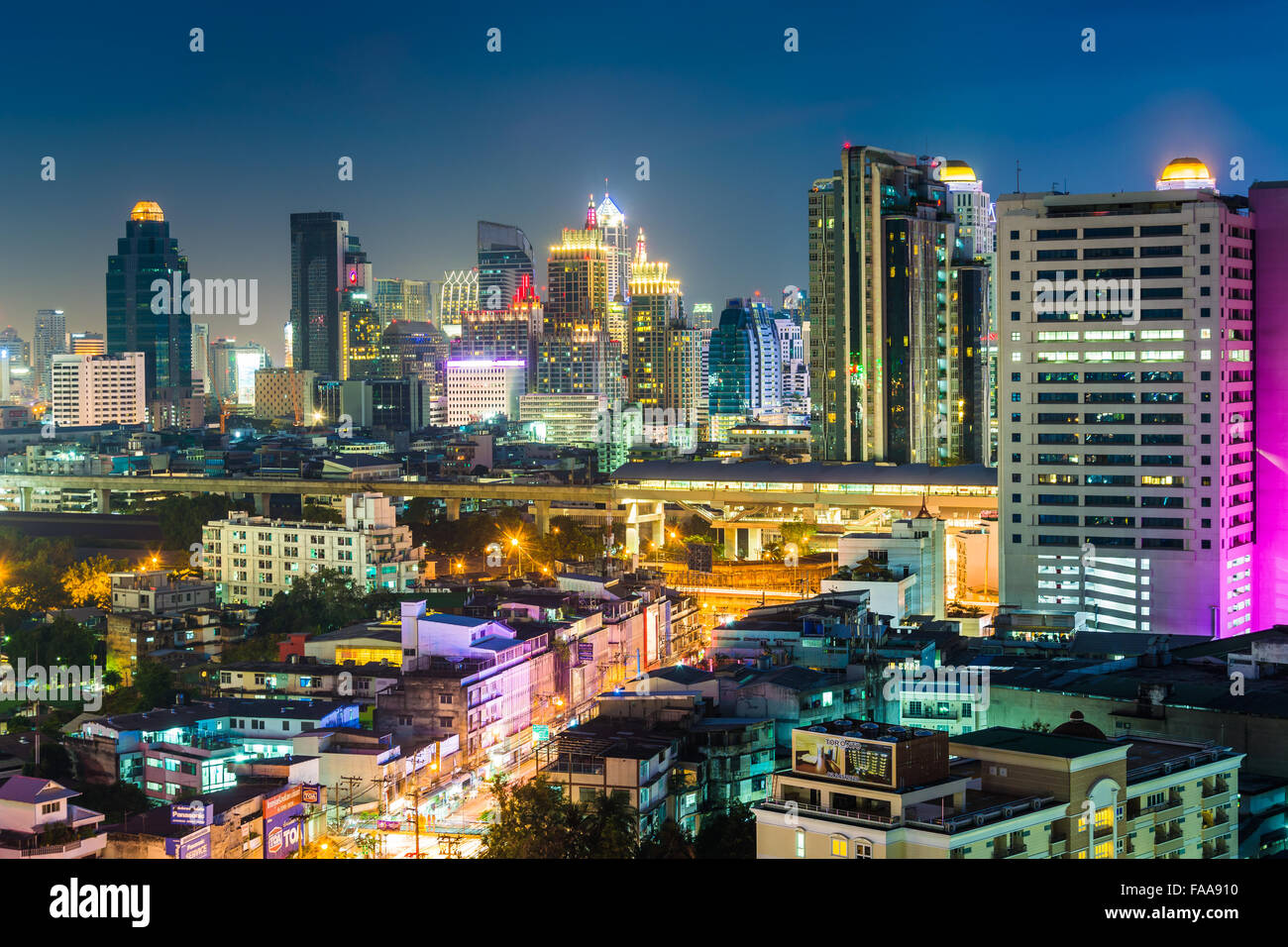 View of modern skyscrapers at night, in Bangkok, Thailand. Stock Photo