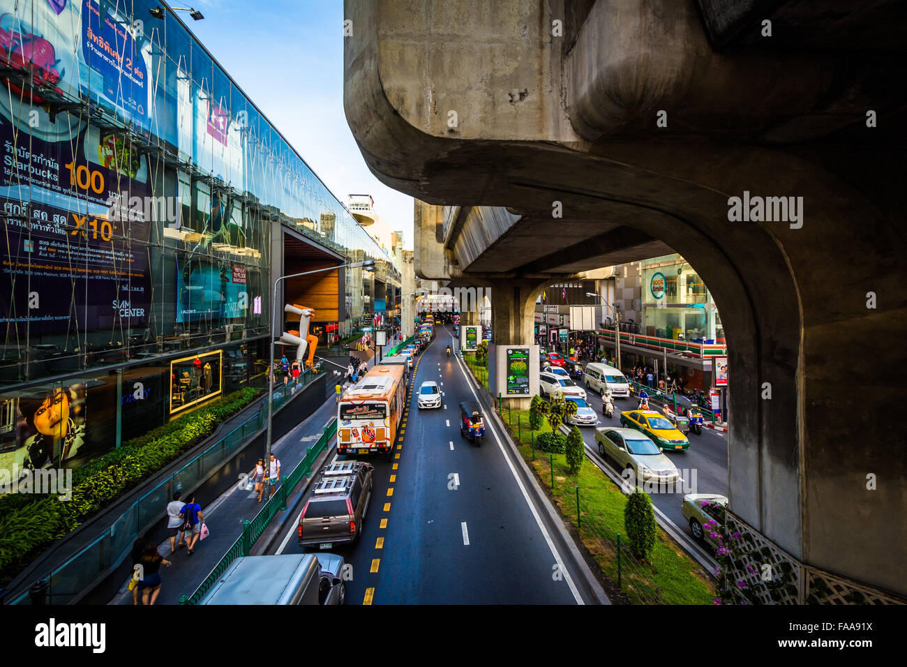 Traffic and skytrain tracks at Siam, in Bangkok, Thailand. Stock Photo