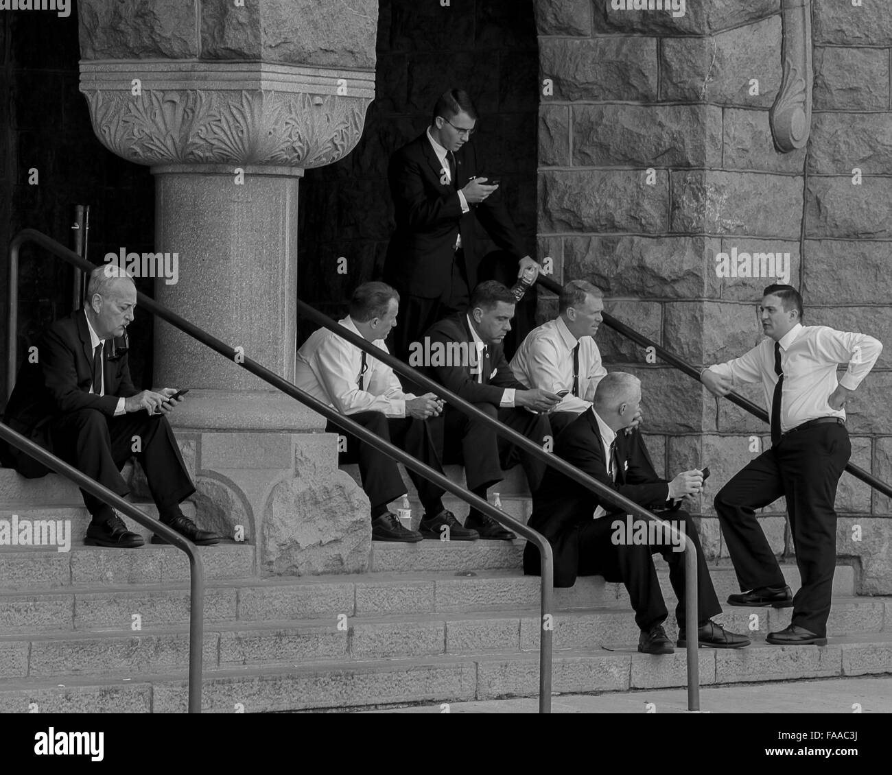 Actors portraying Secret Service agents on set of 11.22.63 in Dallas, Texas. Stock Photo