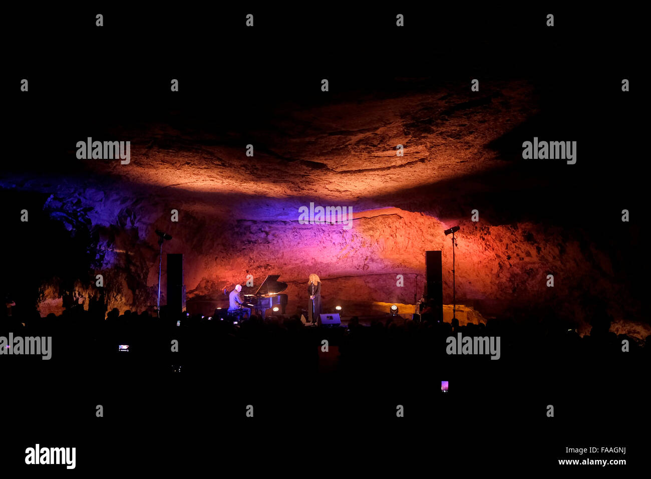 Israeli singer Nurit Galron and Gil Shohat an Israeli classical music composer performing inside Zedekiah's Cave also called Solomon's Quarries an underground  limestone quarry that runs under the Muslim Quarter of the Old City of Jerusalem Israel Stock Photo
