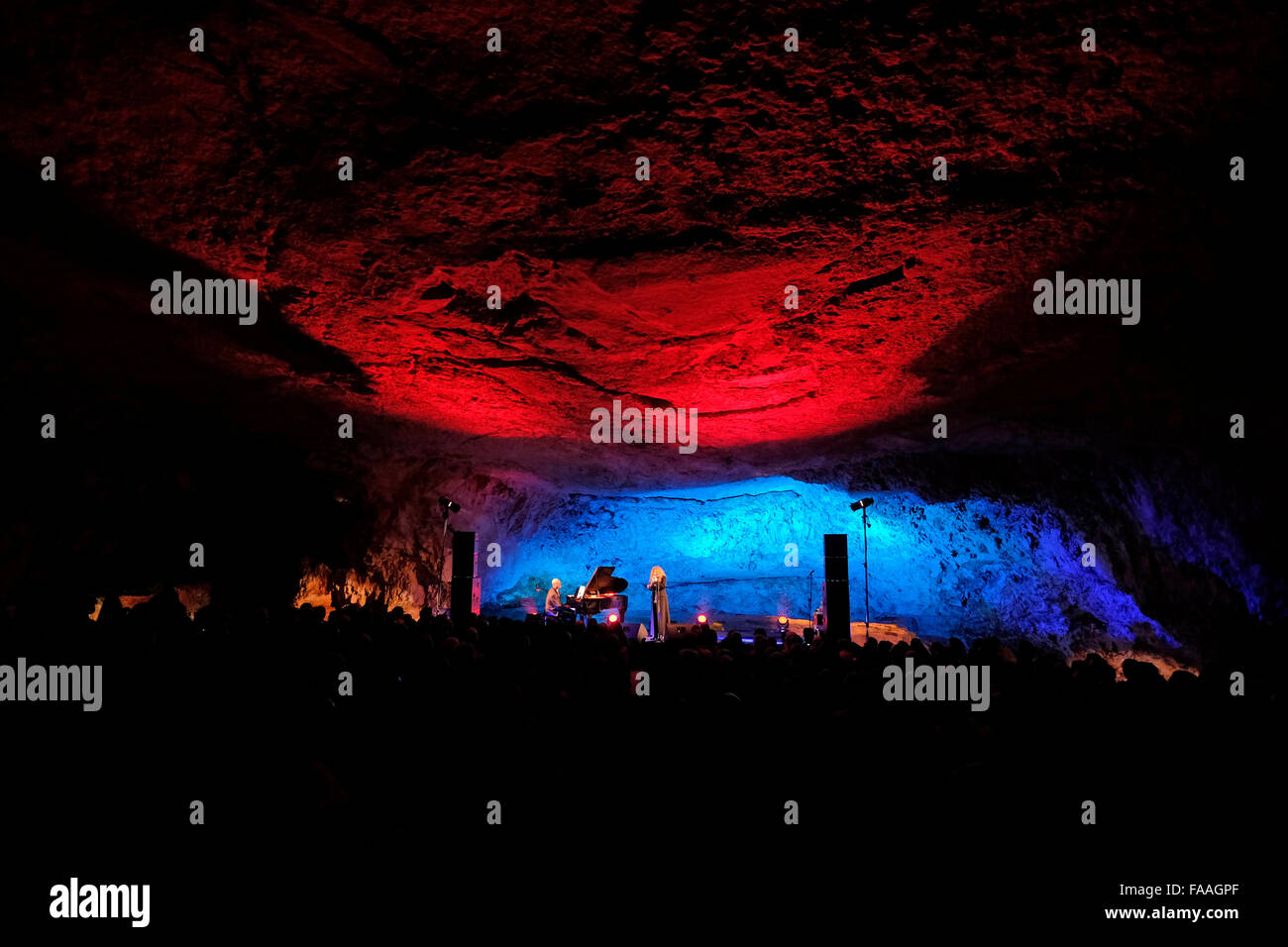 Israeli singer Nurit Galron and Gil Shohat an Israeli classical music composer performing inside Zedekiah's Cave also called Solomon's Quarries an underground  limestone quarry that runs under the Muslim Quarter of the Old City of Jerusalem Israel Stock Photo