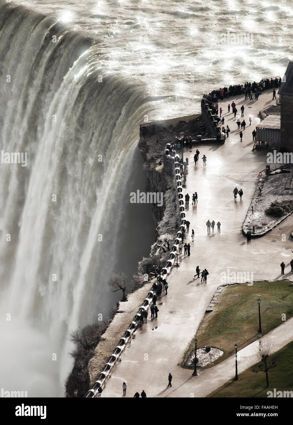 Tourists at Niagara Falls in winter, New York side Stock Photo