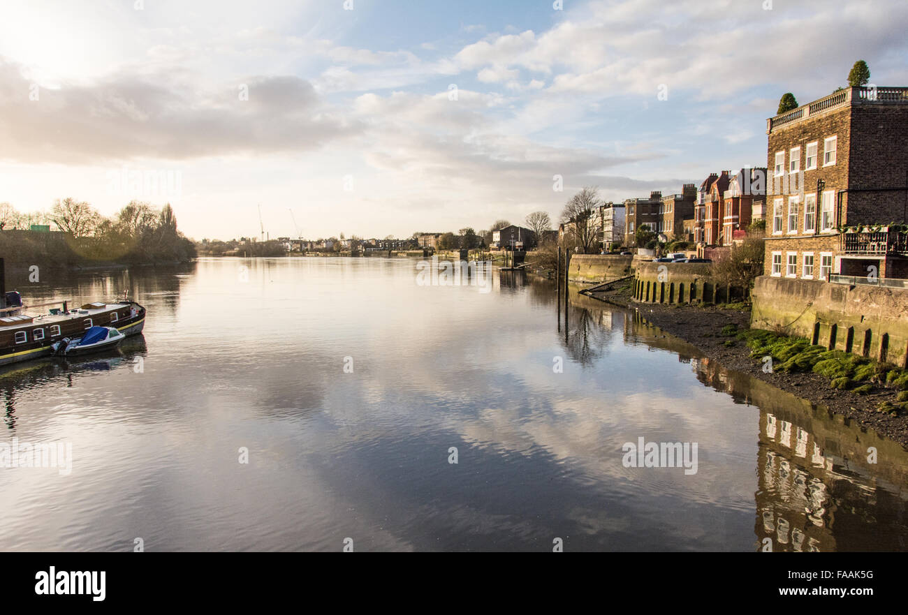 Reflections on a placid River Thames on Hammersmith Upper Mall in West London, England, U.K. Stock Photo