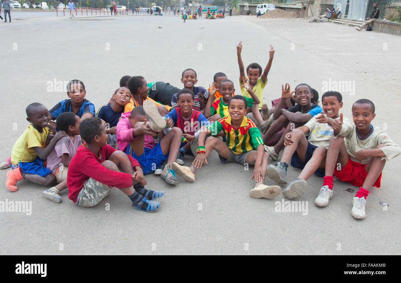 ETHIOPIA, ADDIS ABABA-DECEMBER 12,2013.  Children play soccer on the main street of Addis Ababa, Churchill Street December 12, 2 Stock Photo