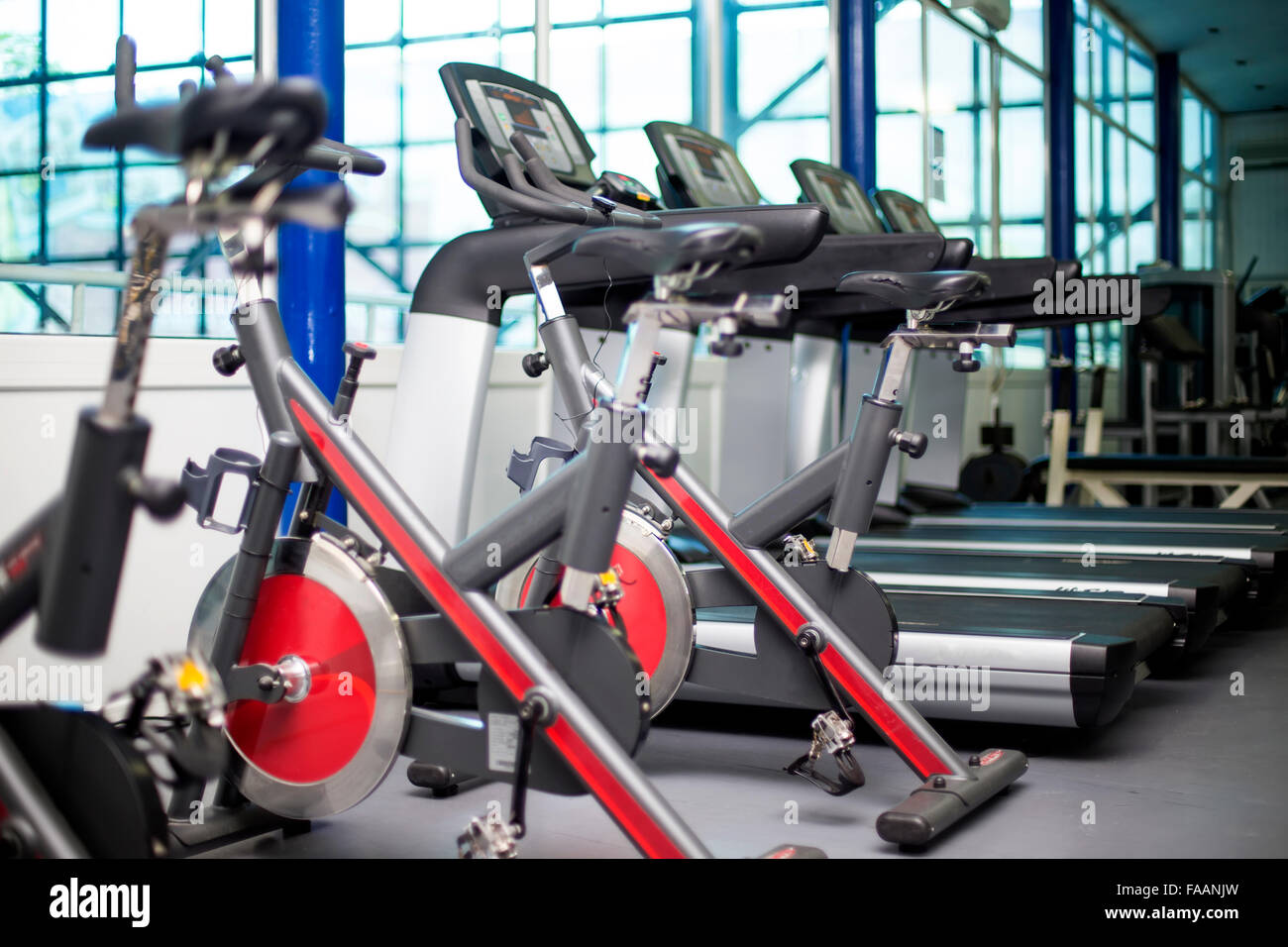 Bikes in the gym Stock Photo Alamy