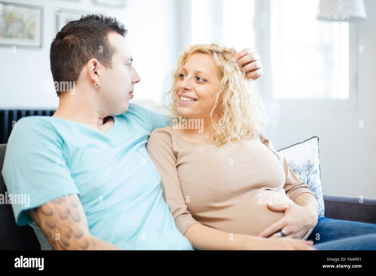 Loving couple wait for baby Stock Photo - Alamy