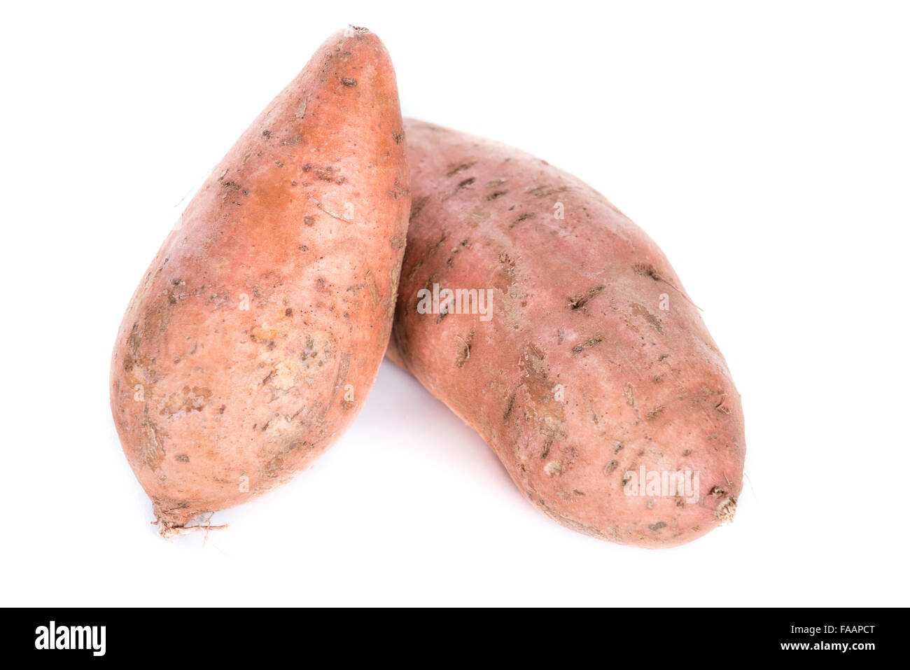 Sweet Potato (close-up shot) isolated on white background Stock Photo