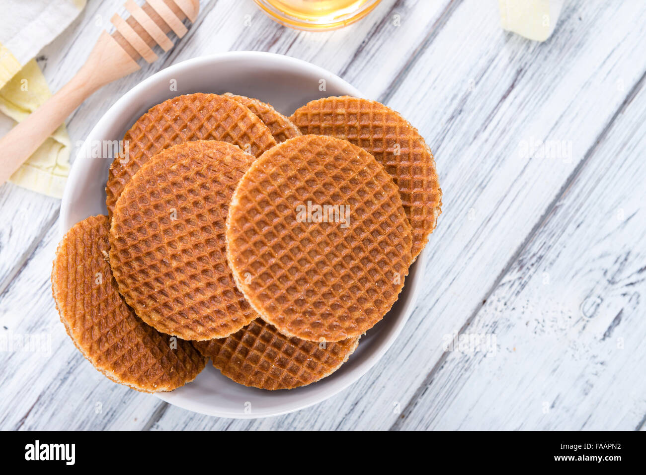 Homemade crispy Waffles filled with honey(close-up shot) Stock Photo