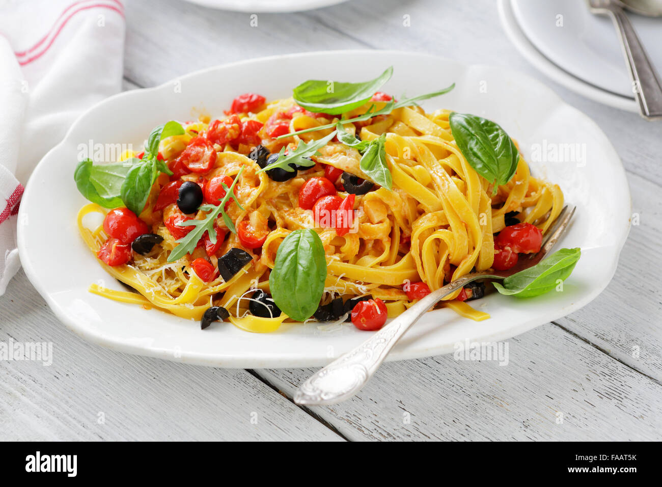 tasty pasta with sauce on plate, food close-up Stock Photo