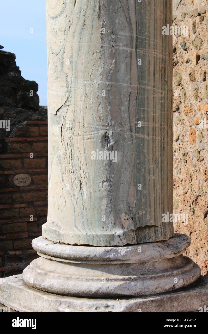 Ancient marble column of a roman temple in Rome, Italy Stock Photo