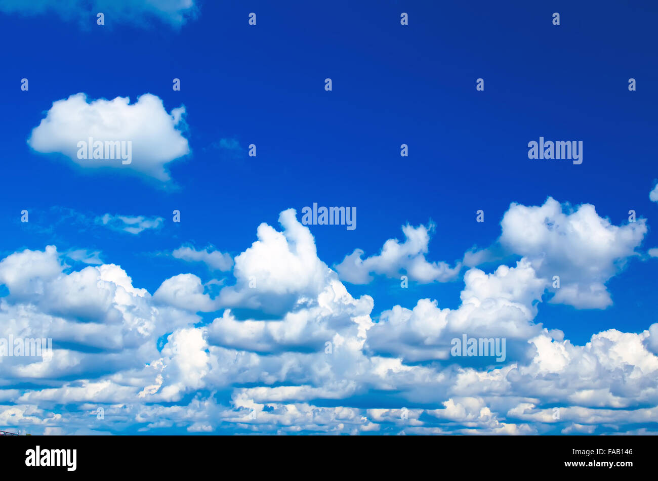 Blue sky with the fluffy white clouds, natural background Stock Photo ...