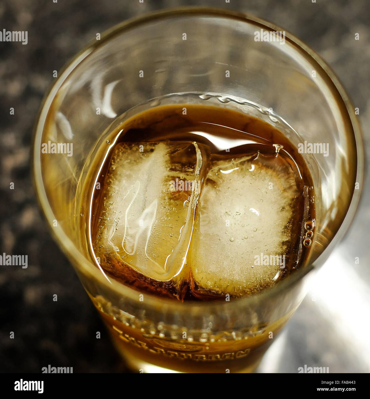 Jim Beam Bourbon Whiskey in a glass with ice and coke Stock Photo Alamy