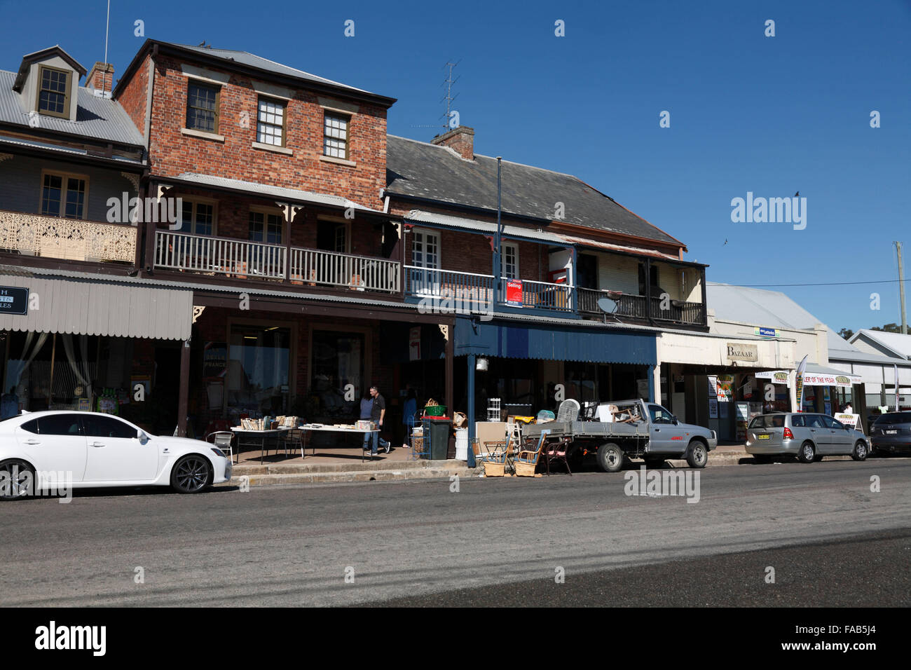 The eclectic retail shops in the historic village are listed by the National Trust - Swan Street Morpeth NSW Australia Stock Photo