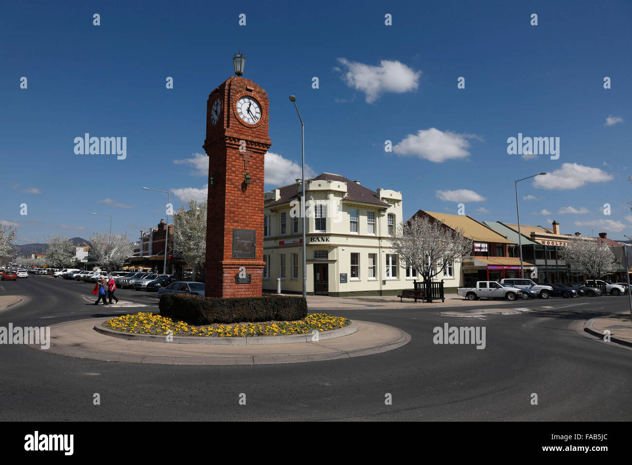 The red brick four sided clock tower commemorates the 50th Anniversary for the end of World War II Mudgee NSW Australia Stock Photo