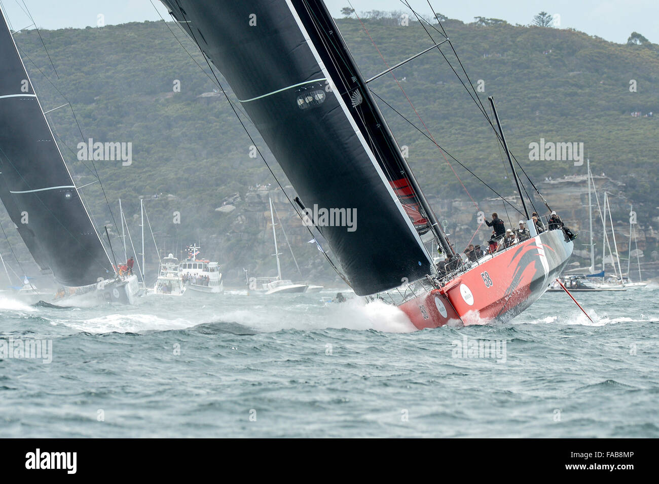 Sydney, Australia. 26th Dec, 2015. Rolex Sydney to Hobart Yacht race 2015. Comanche owned by Jim Clark &amp; Kristy Hinze Clark from SA skippered by skipper Ken Read type 100 Supermaxi during the start of the 629 nautical mile race from Sydney to Hobart on Sydney Harbour. Credit:  Action Plus Sports/Alamy Live News Stock Photo