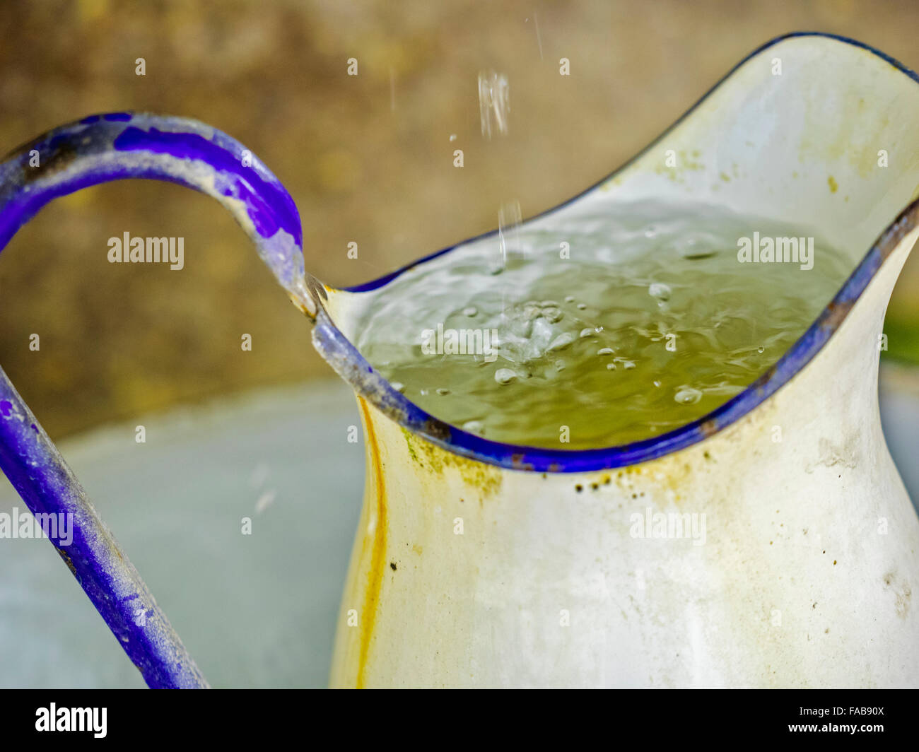 Rustic water pitcher and fountain town of Kaltern in Northern Italy