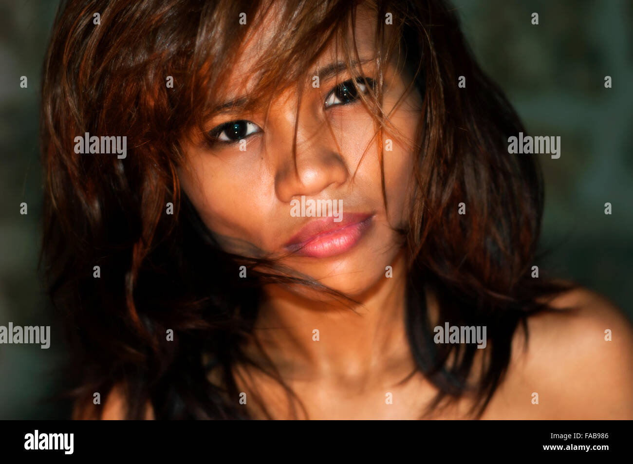 Young Asian woman exotic portrait, on location, Cebu, Philippines Stock Photo