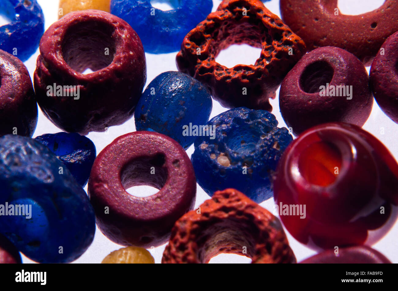 Ancient Roman glass beads in studio setting Stock Photo