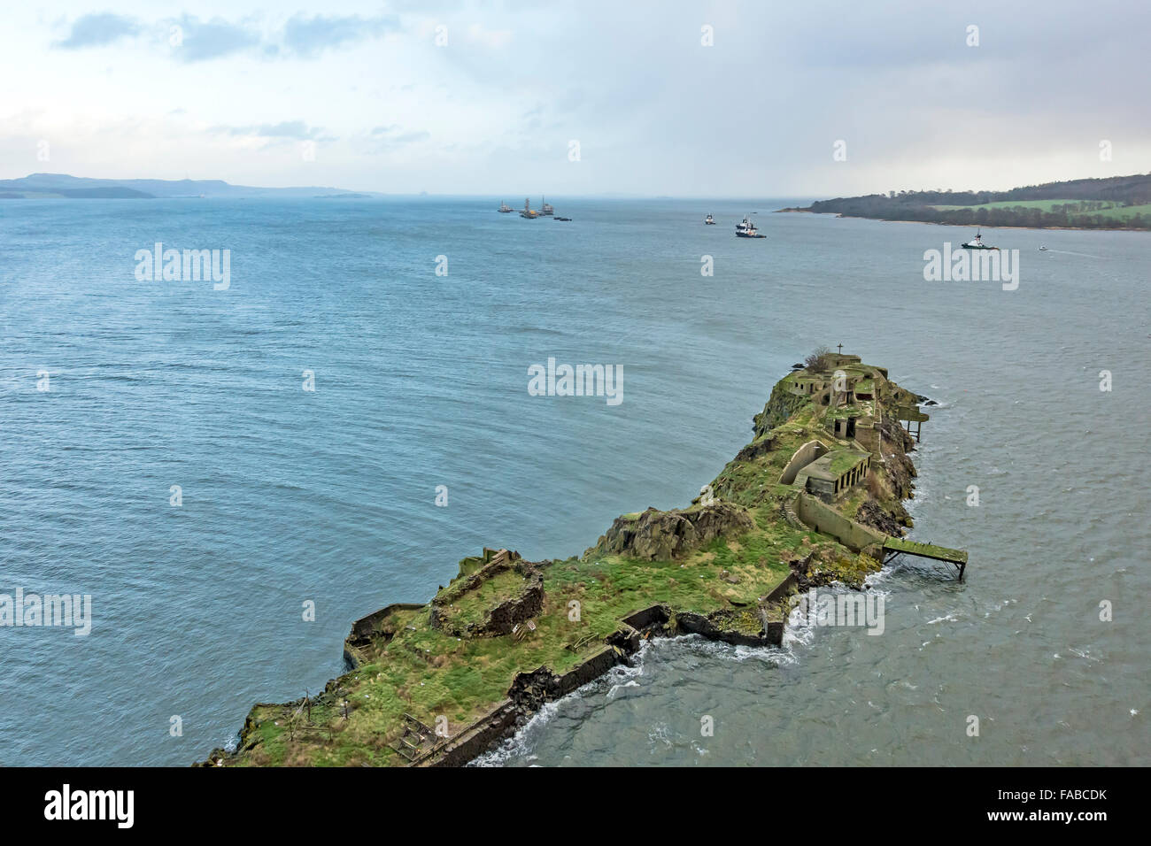 Island Inch Garvie from above Firth of Forth near South Queensferry in Scotland showing remnant ruins from WW2 gun emplacements Stock Photo