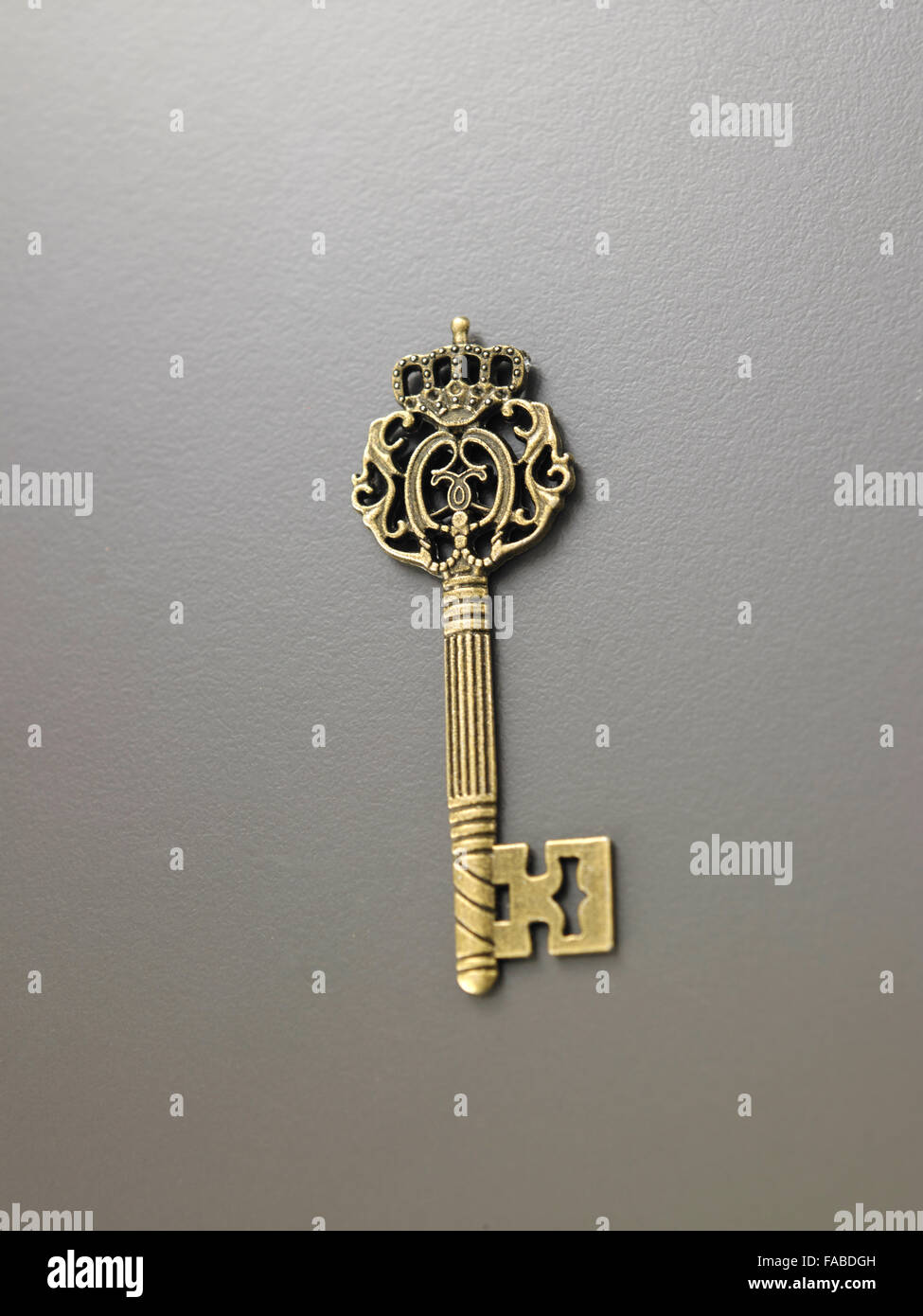key on the gray background Stock Photo - Alamy