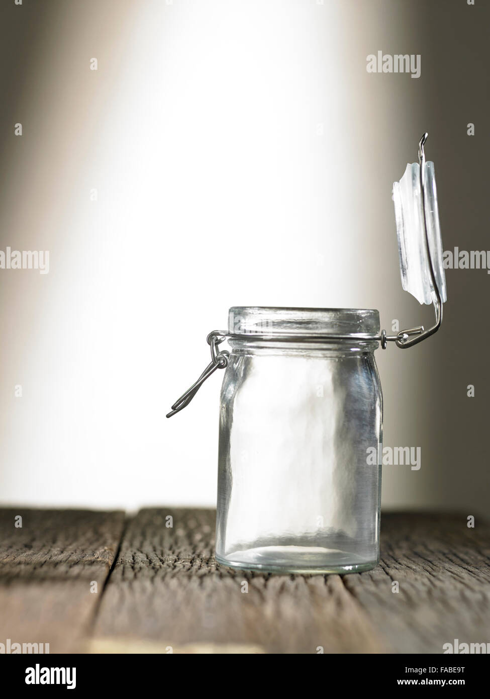 plain glass jar with open lid Stock Photo Alamy