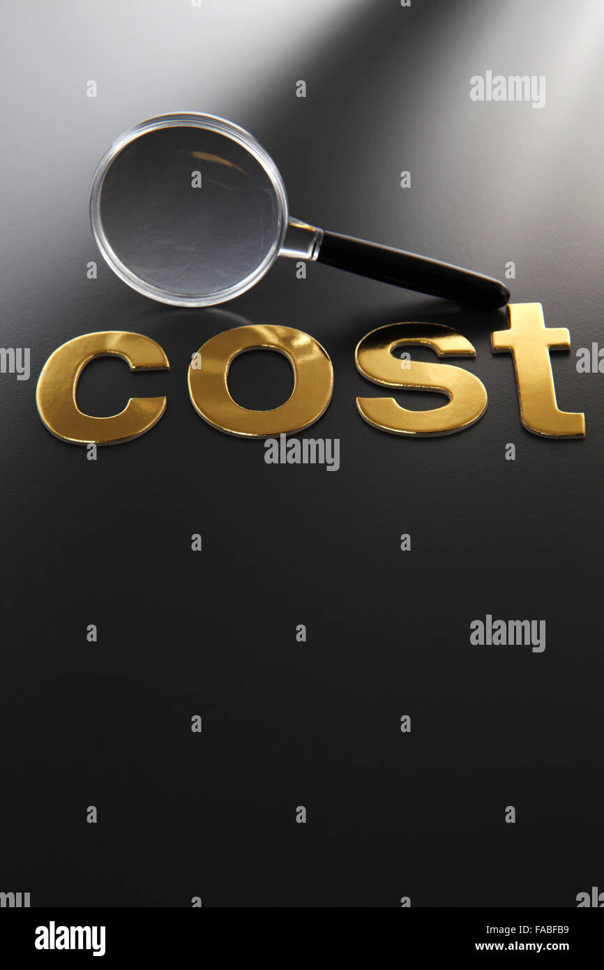 word cost and magnifying glass Stock Photo Alamy
