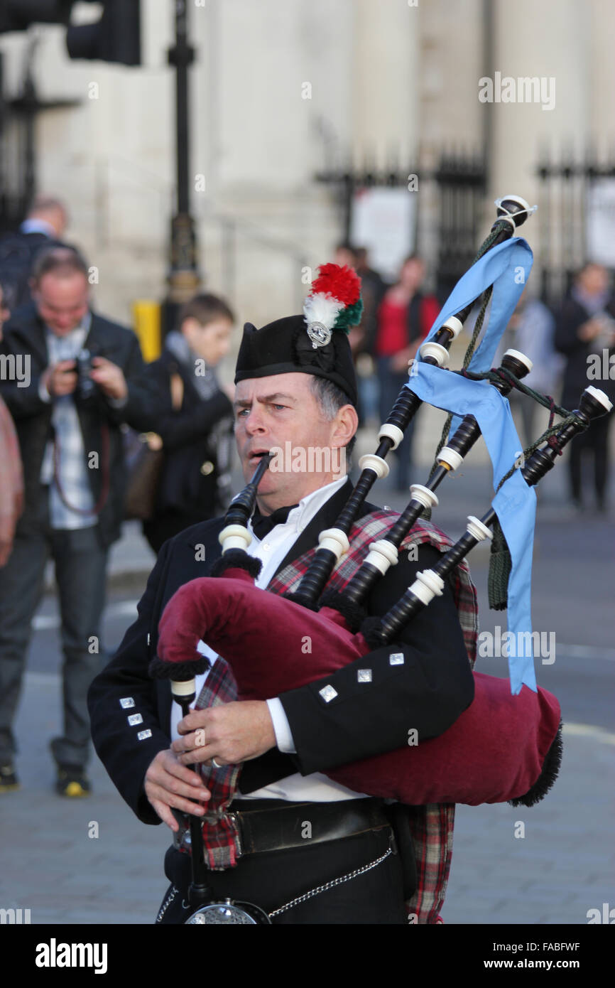 A man playing the bagpipes Stock Photo