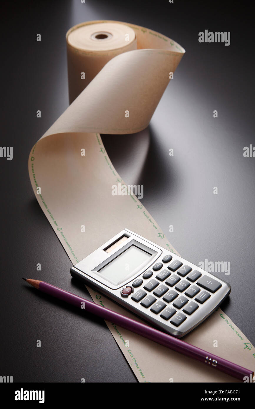 adding machine tape and calculator Stock Photo Alamy