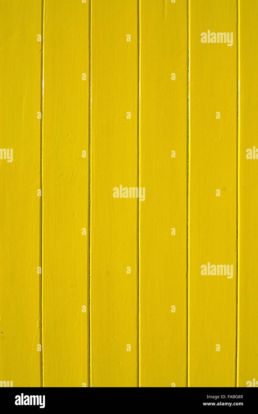 Yellow painted wood background vertical copy space Stock Photo - Alamy
