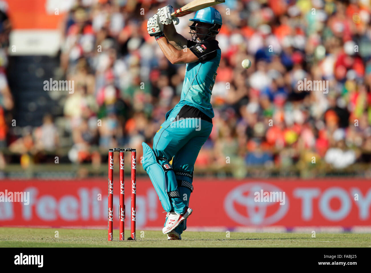 26.12.2015. Perth, Australia. Big Bash Cricker League 05, Perth Scorchers versus Brisbane Heat. Chris Lynn steps outside his off stump to play at the ball during his innings. Stock Photo