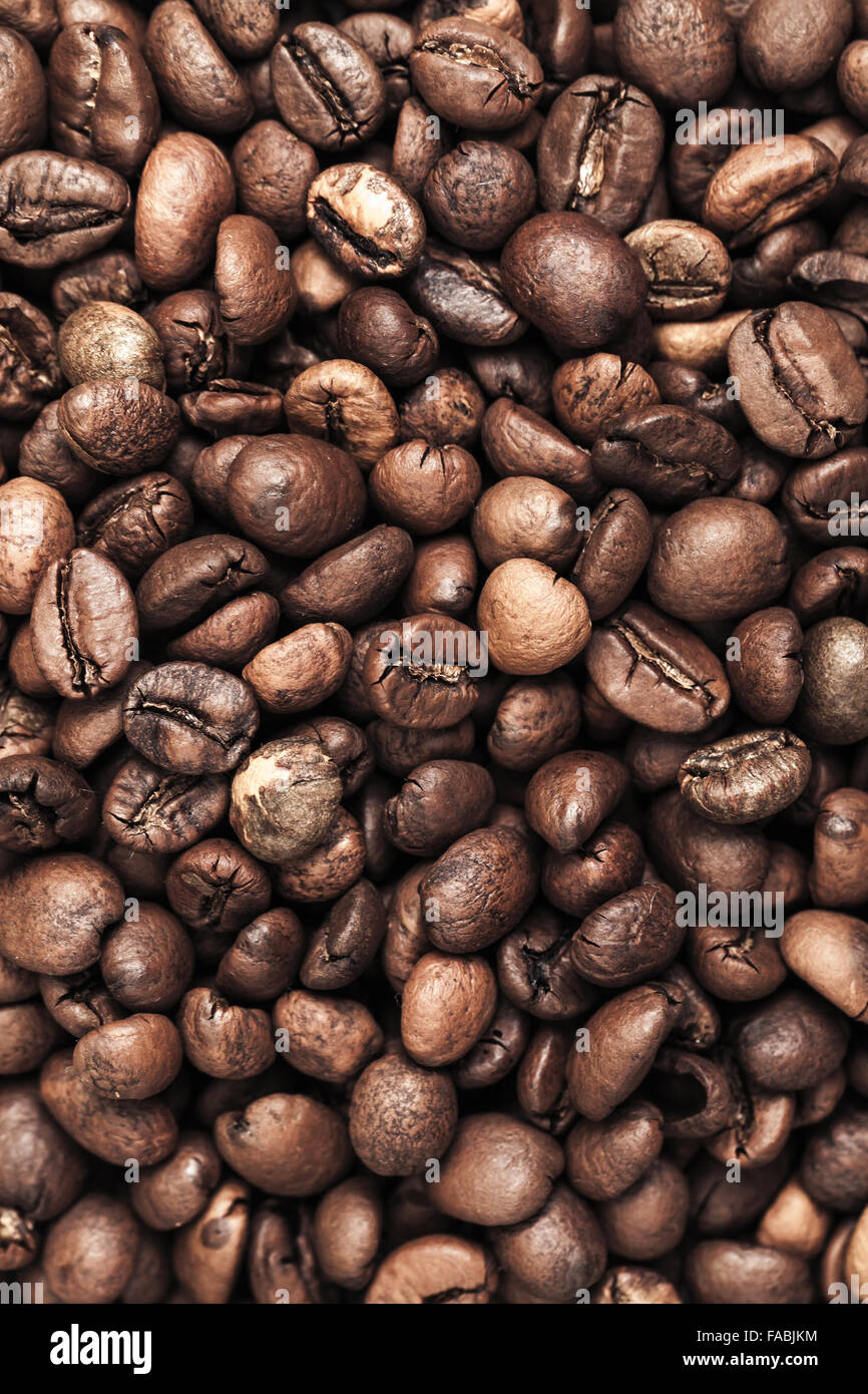 Closeup vertical photo background with dark roasted coffee beans Stock ...