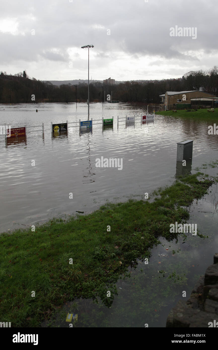 Halifax, West Yorkshire, UK. 26th December, 2015. Heath RUFC in Greetland, Halifax has been flooded once again after heavy rain hits the region and causes more disruptions. Sea containers are floating around as the river Calder overflowed onto their pitch, the adjoining football pitch and the Model car racing track. Credit:  Mick Flynn/Alamy Live News Stock Photo