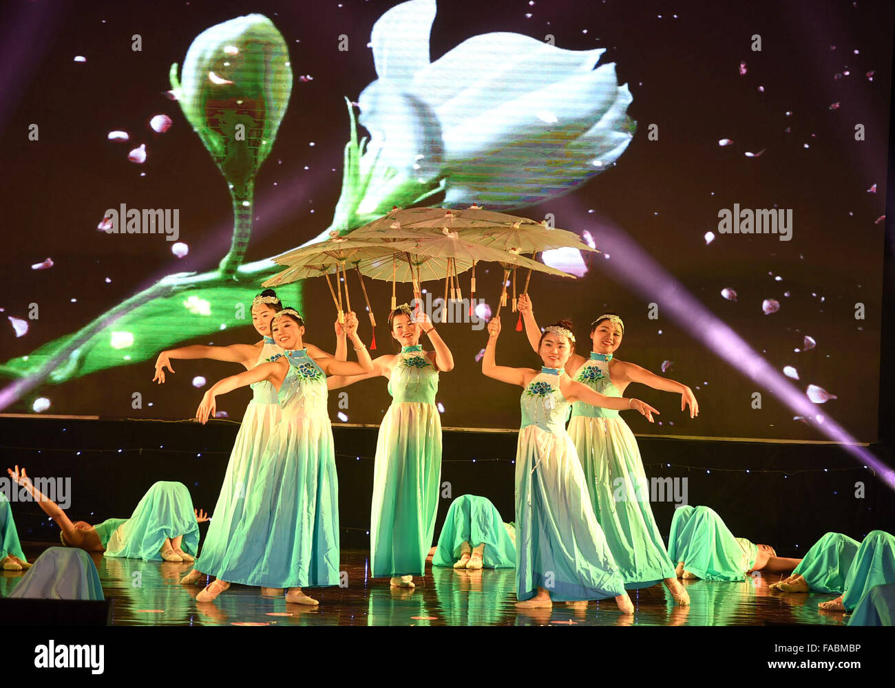 Bozhou. 26th Dec, 2015. Dancers perform during a theatrical performance held in Bozhou, east China's Anhui Province, Dec. 26, 2015 The theatrical performance was held to celebrate the upcoming New Year. Credit:  Liu Qinli/Xinhua/Alamy Live News Stock Photo