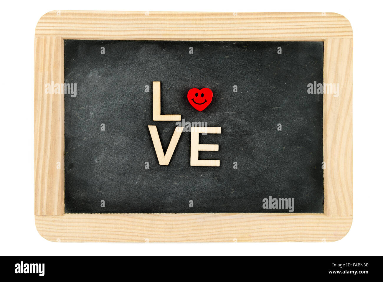 Wooden frame vintage chalkboard isolated on white with word LOVE created of wood letters, red wooden heart shape emoticon in the middle Stock Photo