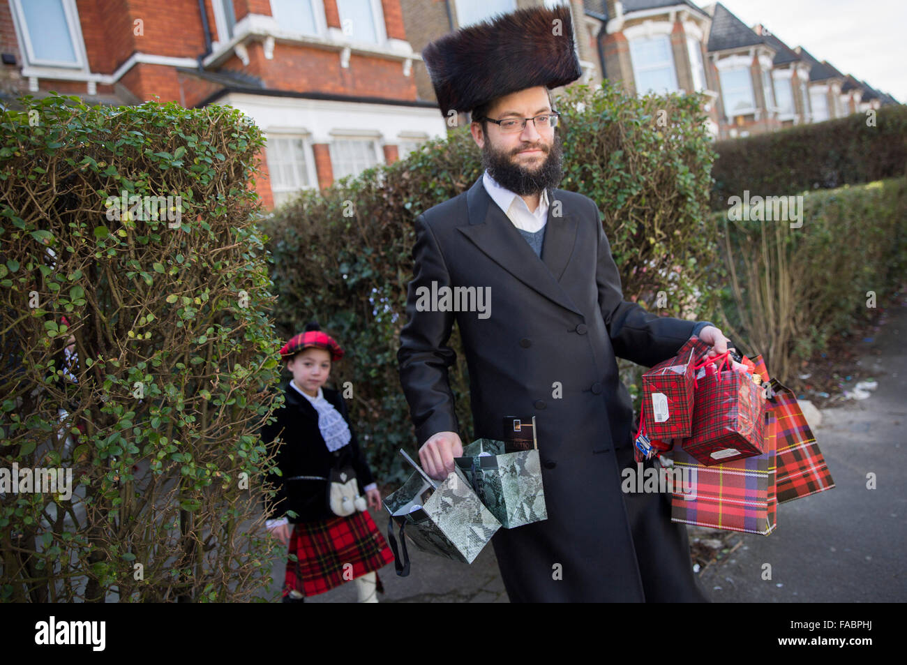 Members of the Jewish Community in Stamford Hill north London take part in the religious festival of Purim Stock Photo