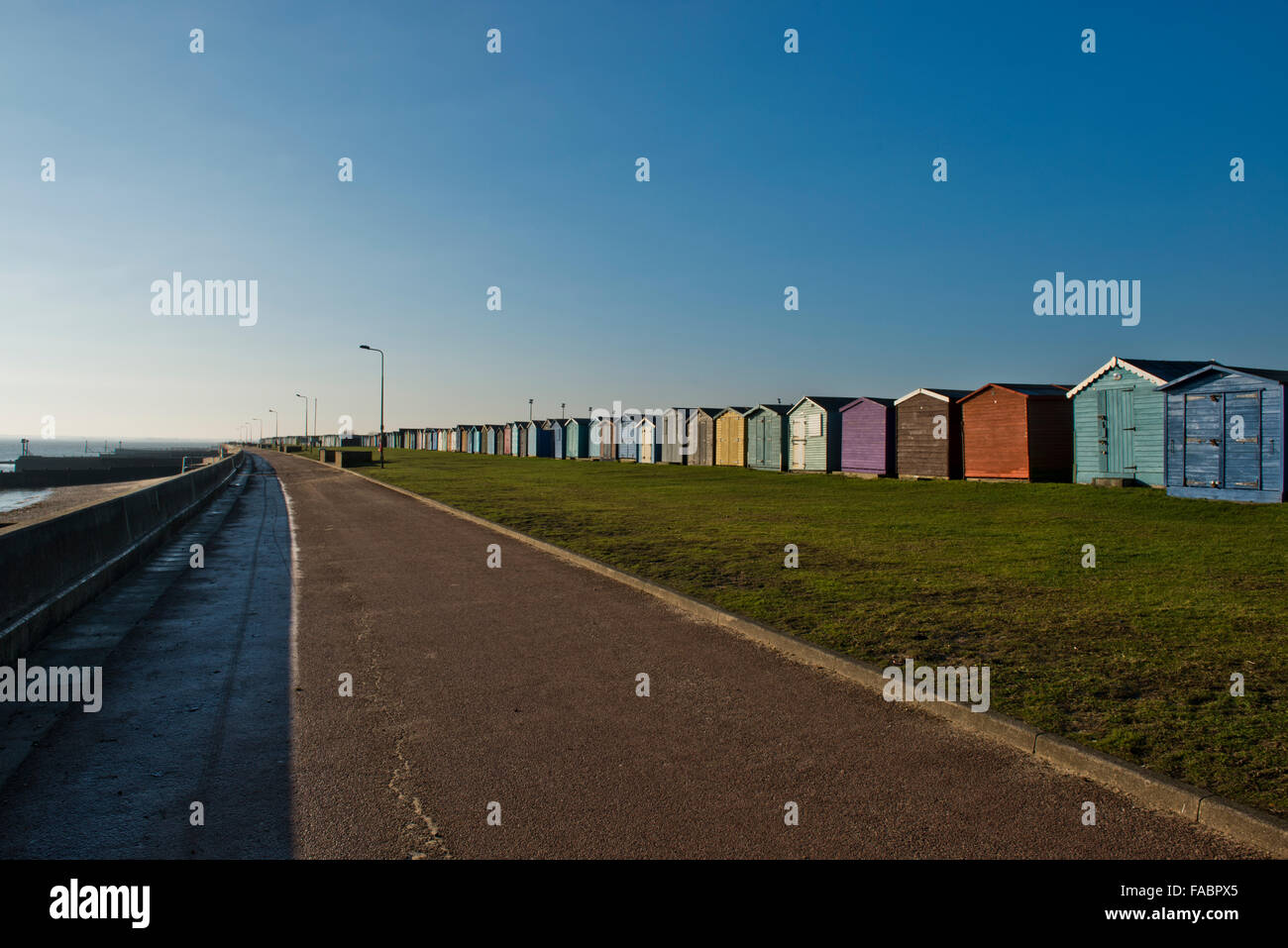 Beach huts on the sea front at Dovercourt, Essex, UK Stock Photo Alamy