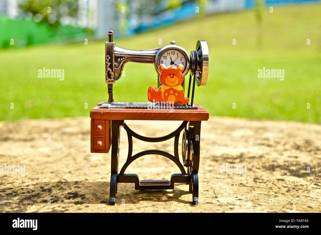 Antic sewing machine shaped watch with Valentine day new year 2016 message Stock Photo