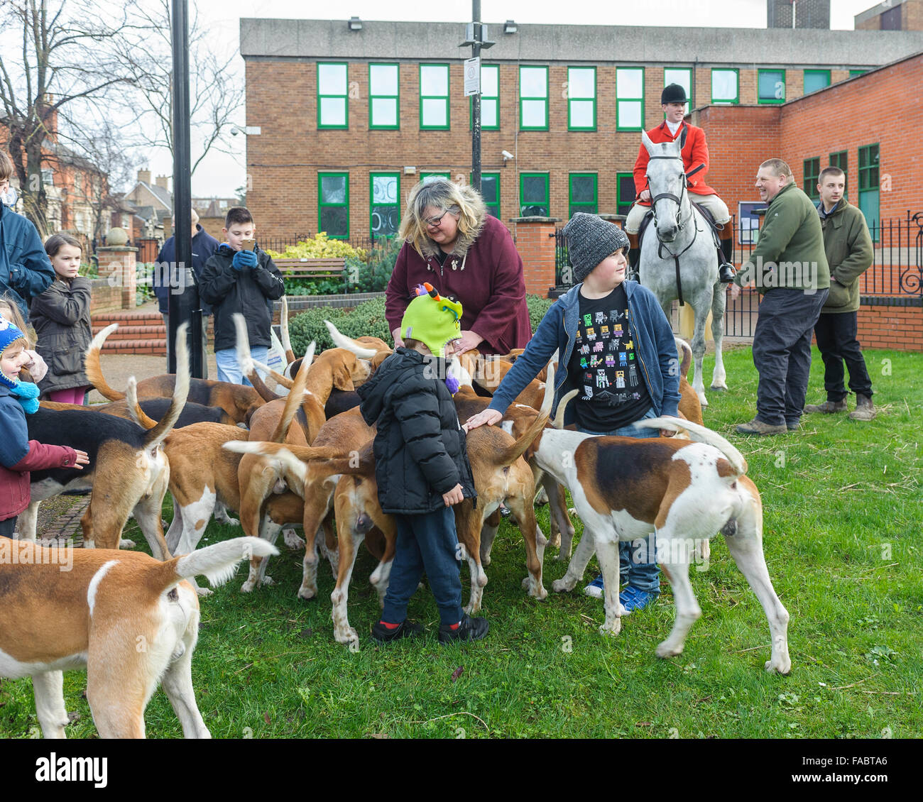Grantham, Lincolnshire, GB. 26th December 2015.  The Belvoir Hunt from nearby Belvoir Castle meet on St Peter Hill to be greeted by the Town Mayor in the tradition Boxing Day Hunt meet.  The meet attracted a large numbers of followers and supports. Matt Limb OBE/Alamy Live News Stock Photo
