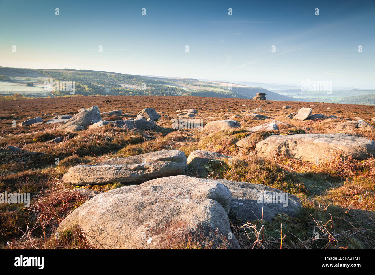 Gritstone Rocks on the Top of Hill in Peak Districts Heatherland Stock Photo