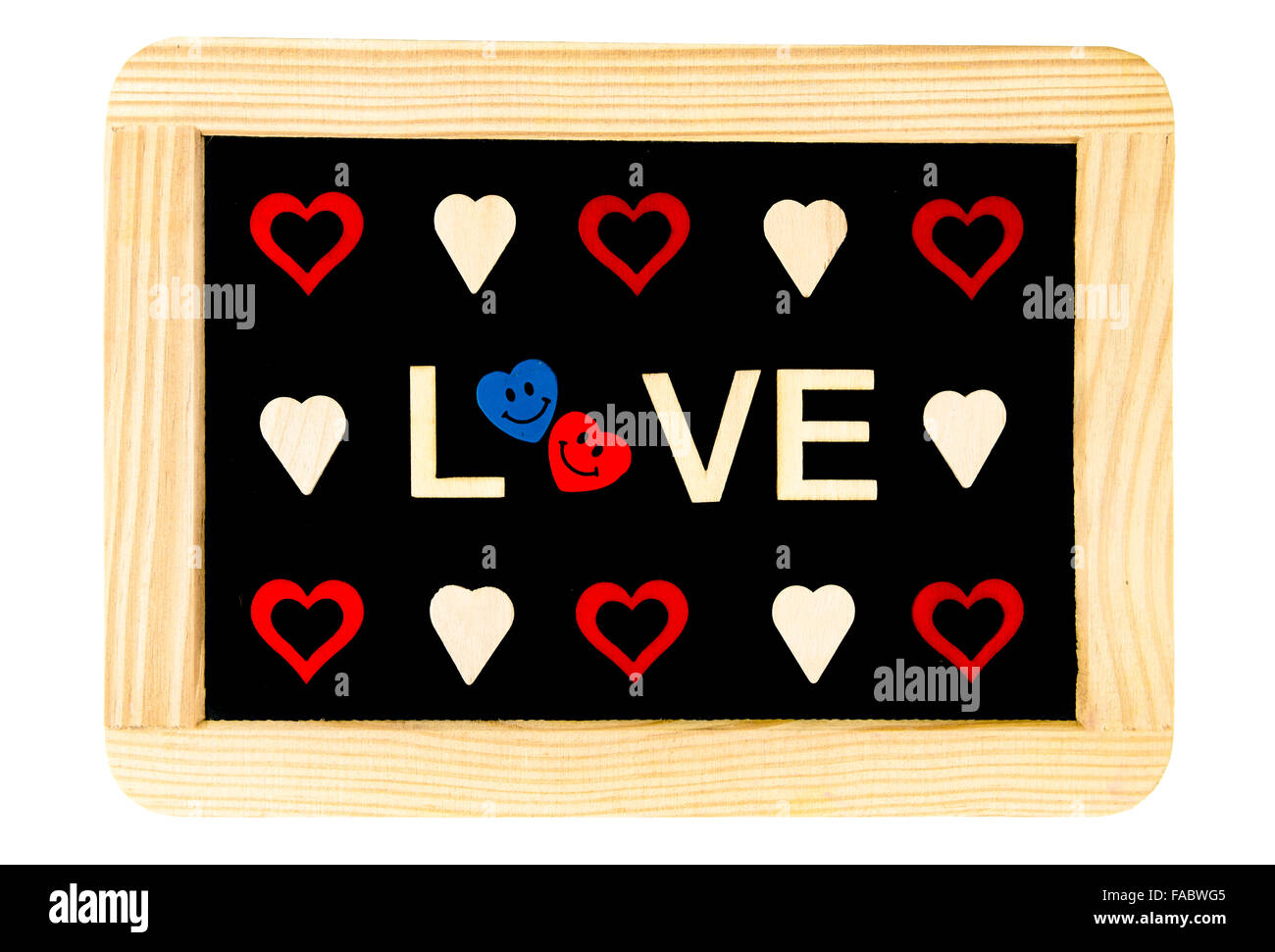 Wooden frame vintage chalkboard isolated on white with Word LOVE created of wood letters and heart shapes around, letter O replaced by pair of smiling in love emoticons, love conceptual image Stock Photo