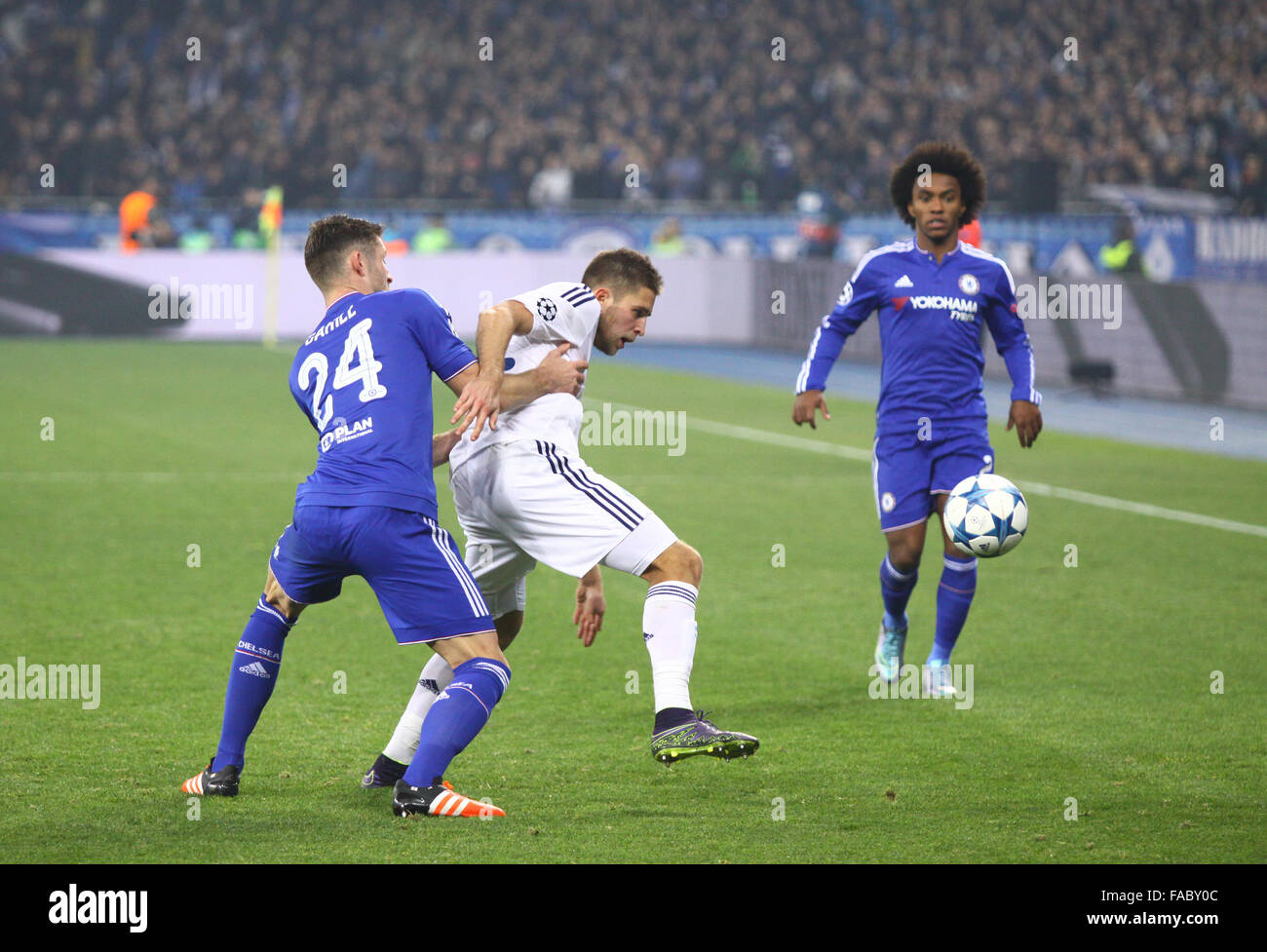 KYIV, UKRAINE - OCTOBER 20, 2015: Artem Kravets of Dynamo Kyiv (C) fights for a ball with Gary Cahill and Willian of Chelsea dur Stock Photo