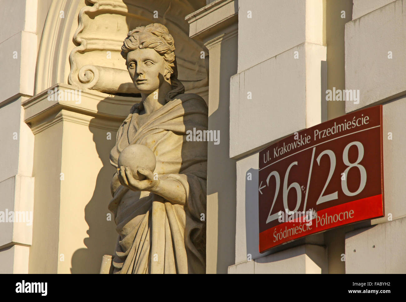 Sculpture of Muse (Urania) at the main gate of University of Warsaw, Poland Stock Photo