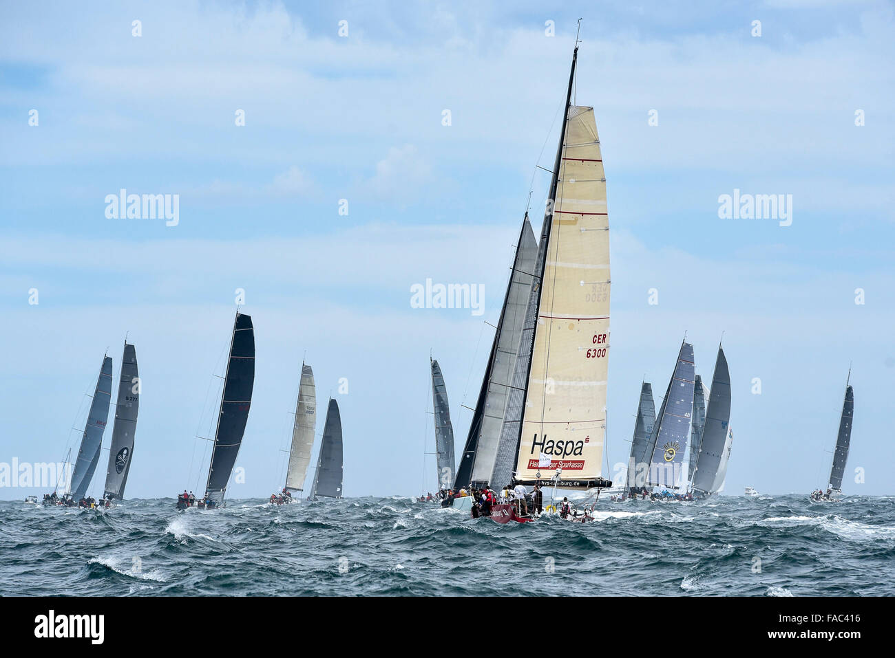Sydney, Australia. 26th Dec, 2015. Rolex Sydney to Hobart Yacht race 2015. The rest of the fleet heads out to sea during the start of the 629 nautical mile race from Sydney to Hobart on Sydney Harbour. Haspa Hamburg from Germany type J/V 52. © Action Plus Sports/Alamy Live News Stock Photo