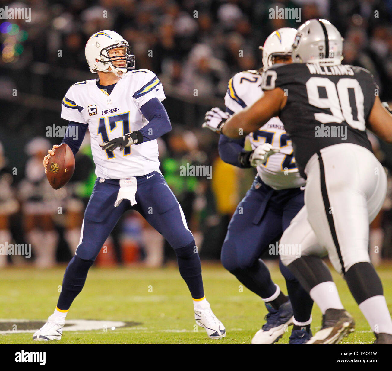 24.12.2015. Oakland, CA, USA - The San Diego Chargers' Philip Rivers (17) throws in the first half against the Oakland Raiders at Oakland Colliseum in Oakland, Calif., on Thursday, Dec. 24, 2015 Stock Photo
