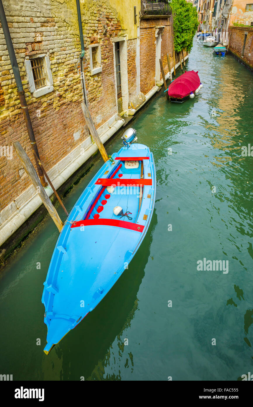 boats and barges on canal, Venice Stock Photo