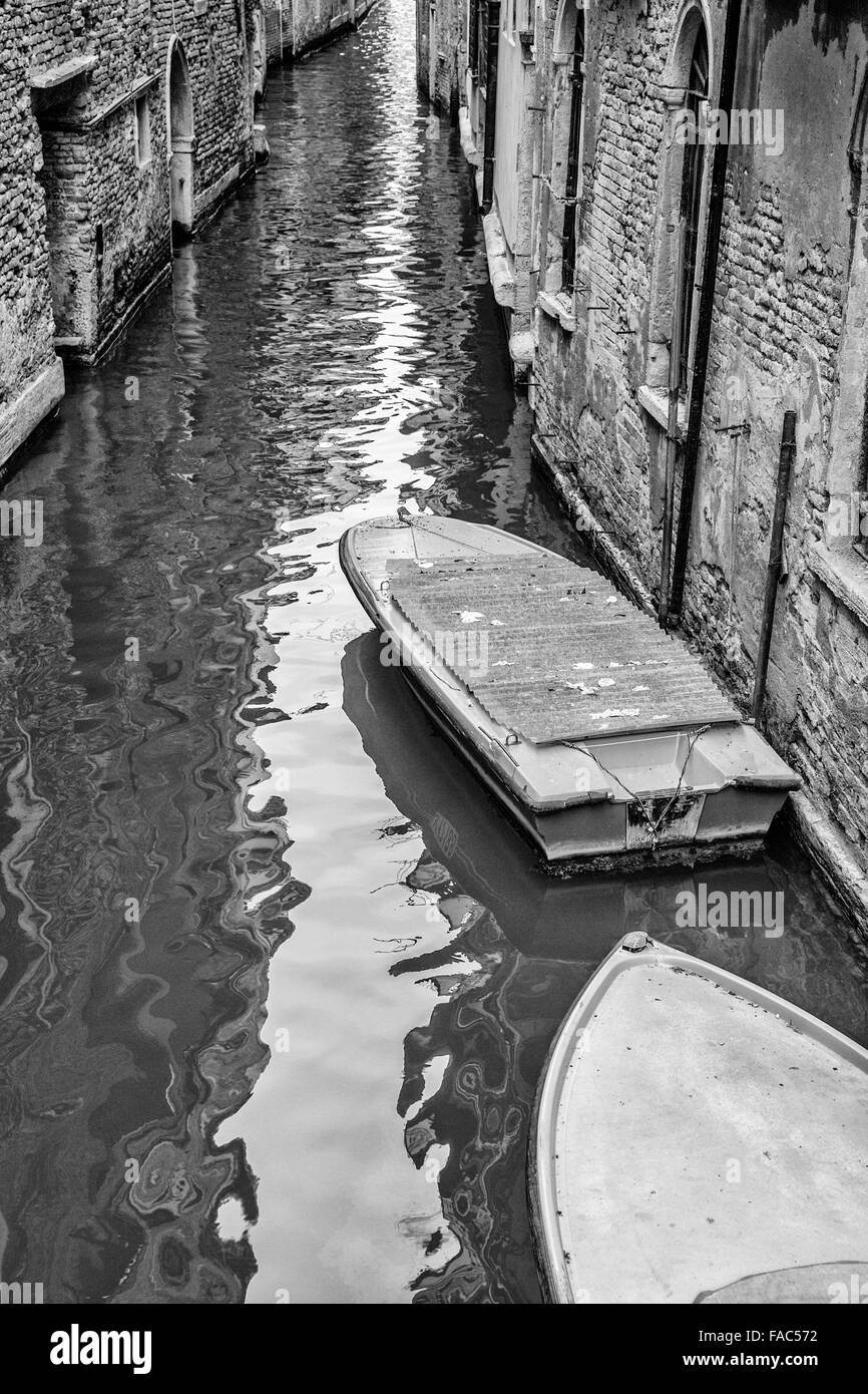 boats and barges on canal, Venice Stock Photo