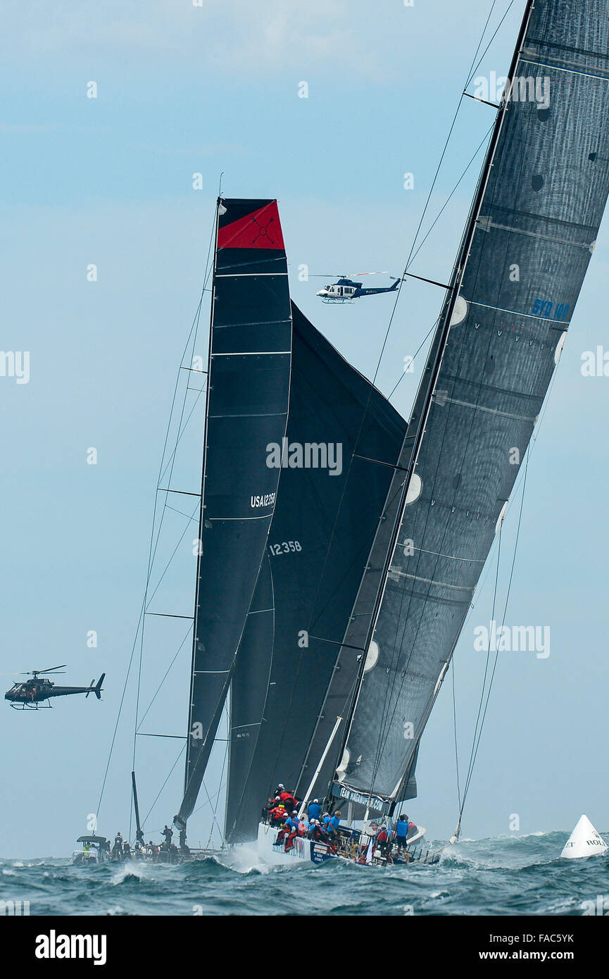 Sydney, Australia. 26th Dec, 2015. Rolex Sydney to Hobart Yacht race 2015. The leaders head out to see. Comanche owned by Jim Clark &amp; Kristy Hinze Clark from SA skippered by skipper Ken Read type 100 Supermaxi and Ragamuffin 100 owned by Syd Fischer from NSW skippered by David Witt type Dovell 100 head out to sea. © Action Plus Sports/Alamy Live News Stock Photo